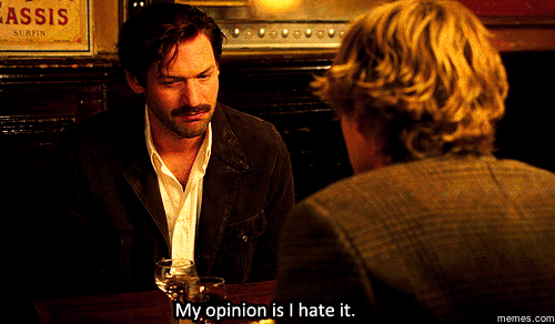 Gif of the character Ernest Hemingway from Midnight in Paris (2011) nodding as he says, 